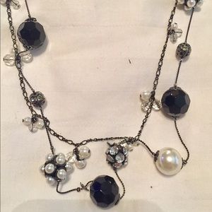 Lovely long necklace to make any outfit pop.